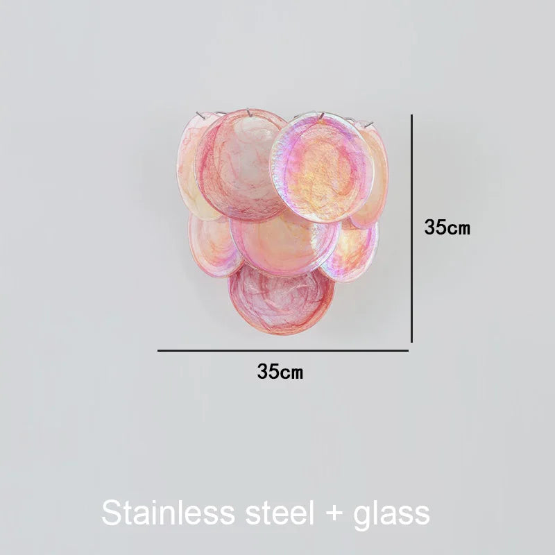 Linear glass disc chandelier, 35.4 inches long, above a dining table