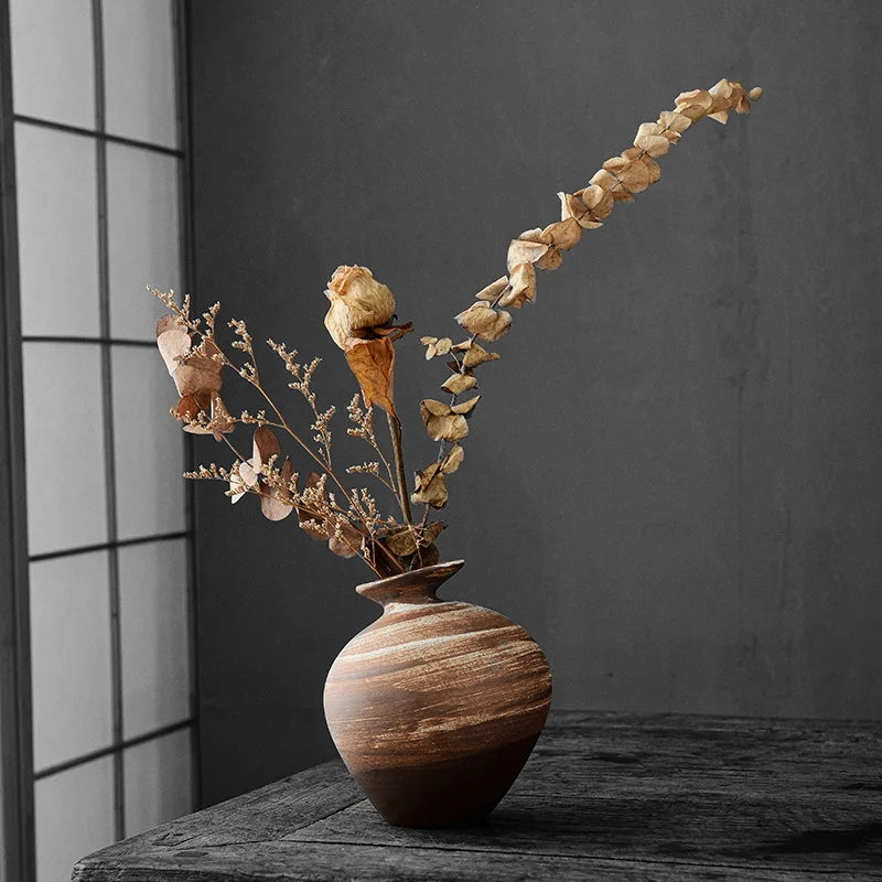 Rough ceramic vase five style variants grouped display