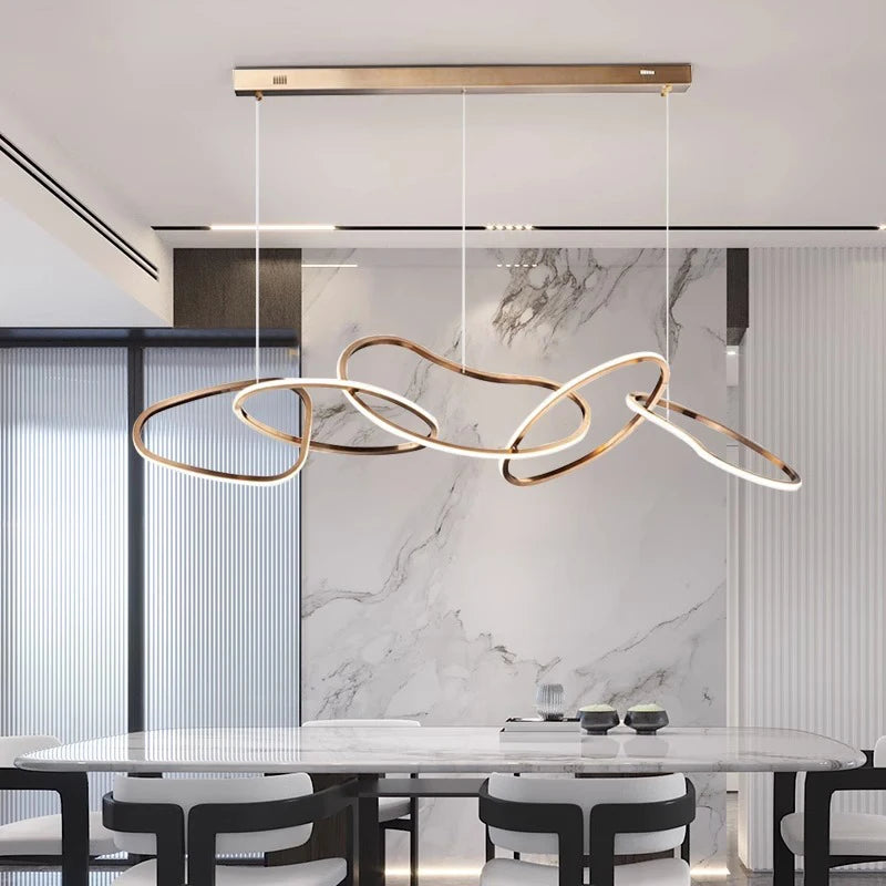 Six ring acrylic chandelier spanning 150 centimetres on an ironware frame