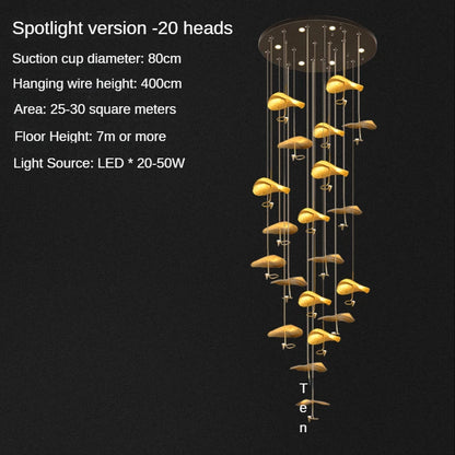 Copper lotus chandelier shown lit in warm white LED light