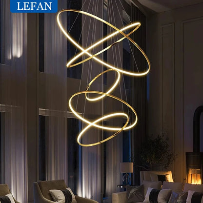 Six ring chandelier in gold with stacked aluminum light circles