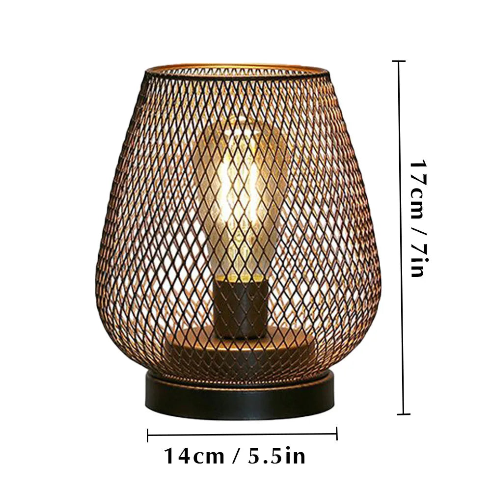 Metal cage lamp set of two egg style displayed on wooden surface
