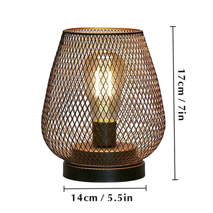 Metal cage lamp set of two egg style displayed on wooden surface