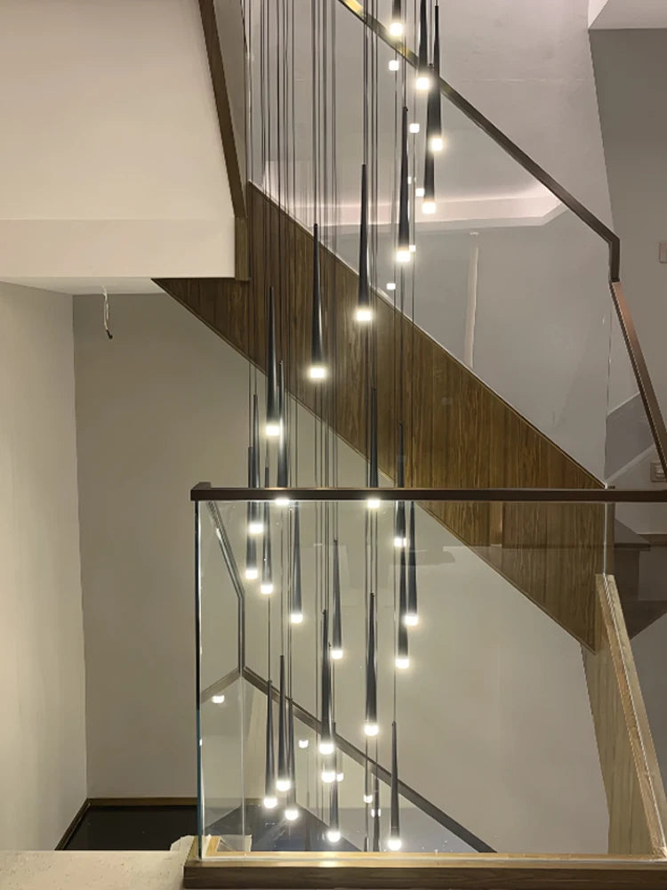 Thirty head staircase chandelier with a 196.9 in cord pendant drop
