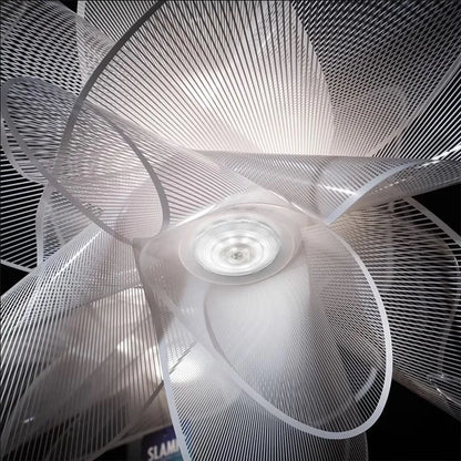 White petal ceiling lamp with light emerging around each panel edge