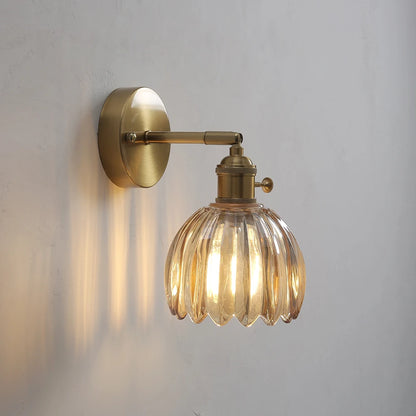 green glass wall sconce, installed in a room interior setting