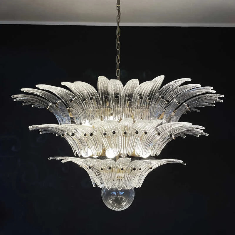 Champagne toned glass shades on a vintage style metal chandelier frame