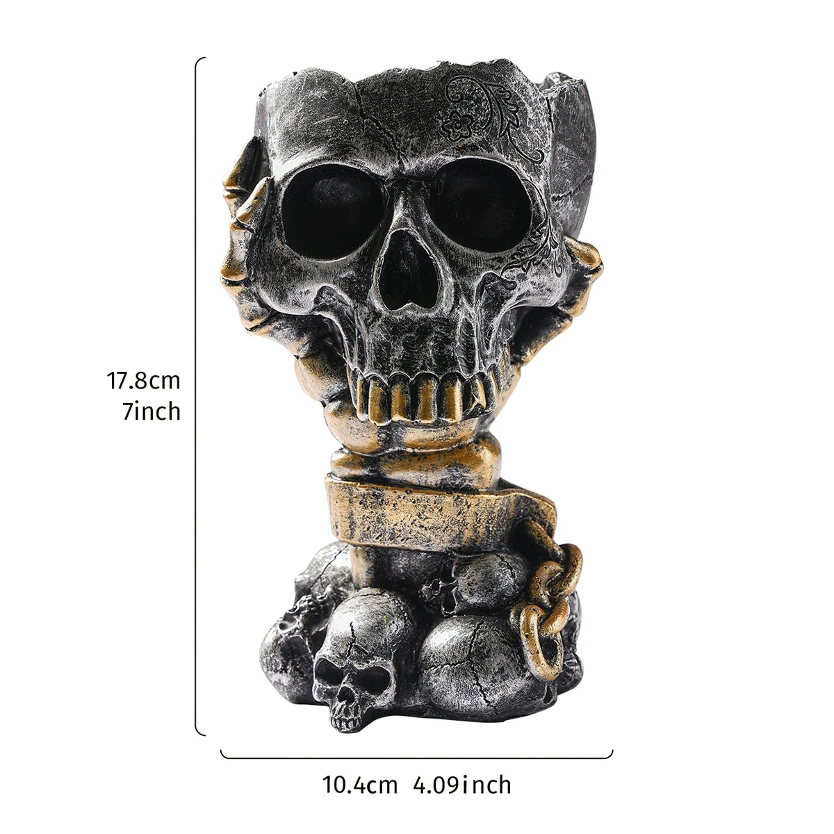 Silver-black skull resin vase dramatic display on a gothic-styled dark shelf