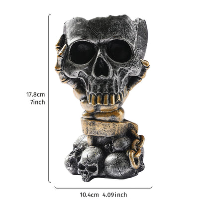 Silver-black skull resin vase dramatic display on a gothic-styled dark shelf