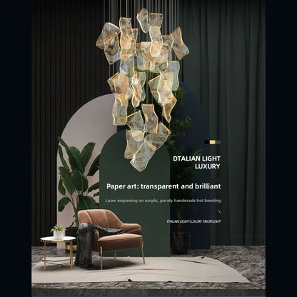 Acrylic streamer chandelier casting light both up and down