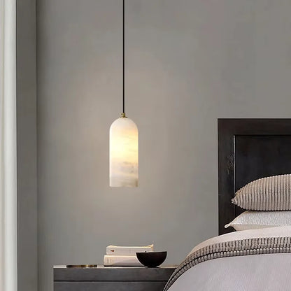 Marble shade chandelier on a plated gold stem and cord
