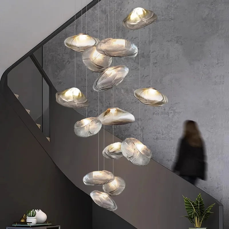 Crystal cluster staircase chandelier with glass drops at staggered heights