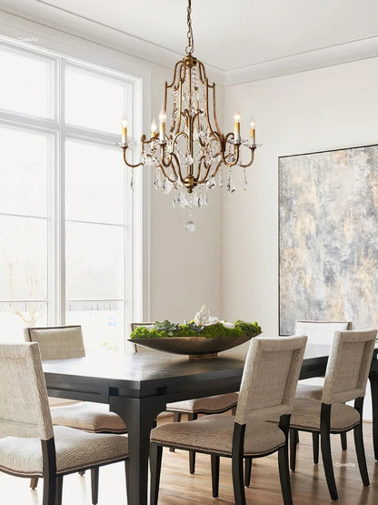 Antique gold chandelier at 16.5 in diameter with four candle lights