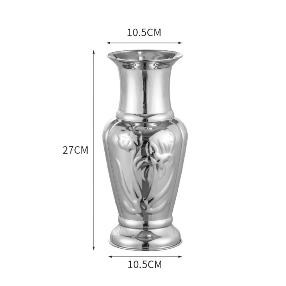 Close-up of stainless steel vase base showing polished metallic finish detail