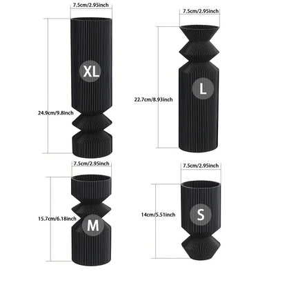 Four-piece matte black plastic vase set in S, M, L, and XL sizes