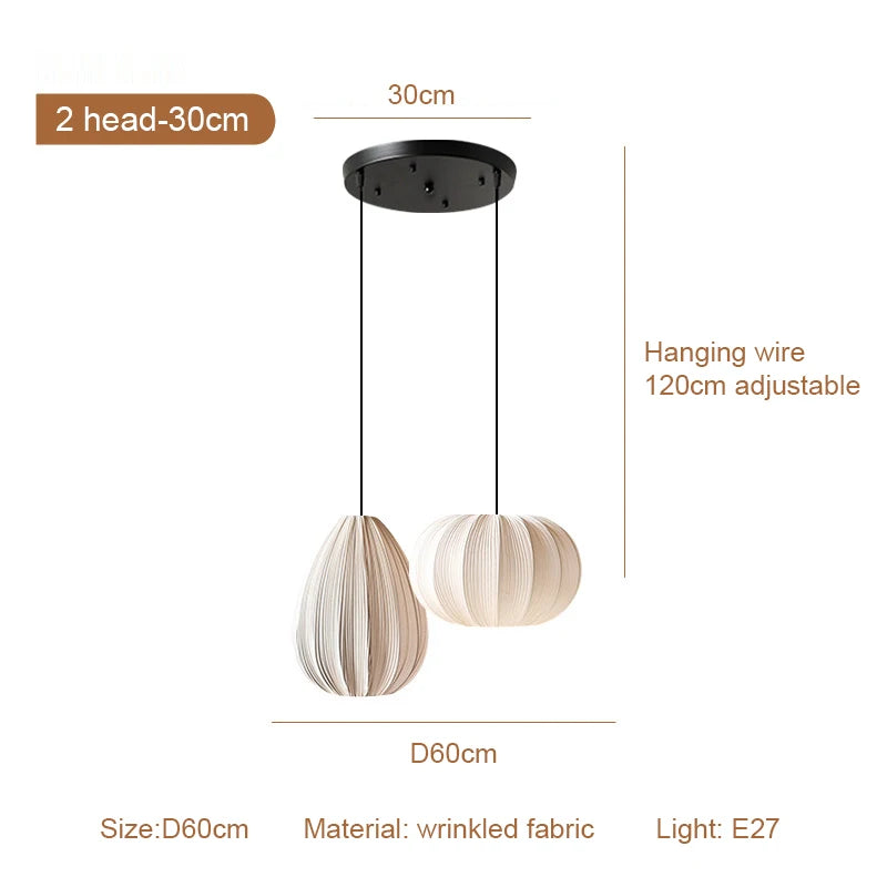 Fabric pumpkin chandelier shade with soft vertical rib shadows