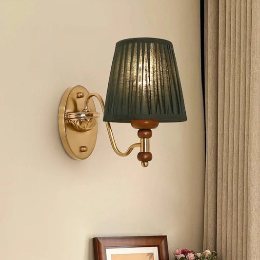 green fabric shade wall sconce, front view on white background