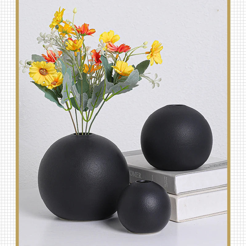 Black ball ceramic vase small size on white Scandi minimalist shelf display
