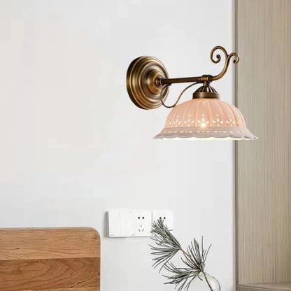 brass wall sconce, side profile showing mounting depth