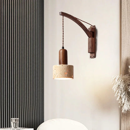 travertine stone wall sconce, installed in a room interior setting