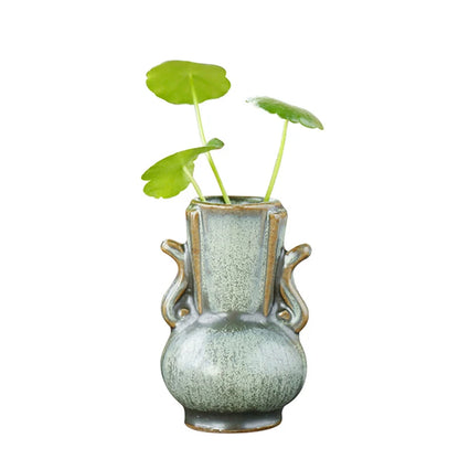 Close-up of retro green ceramic vase texture and glaze