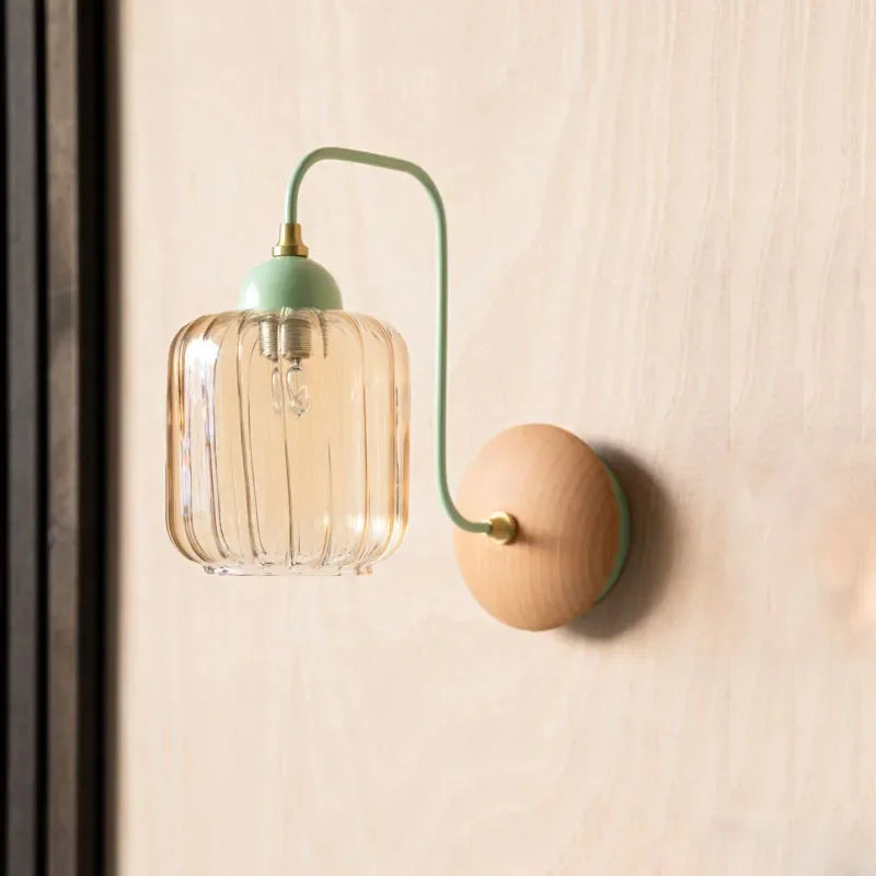 amber glass wall sconce, front view on white background