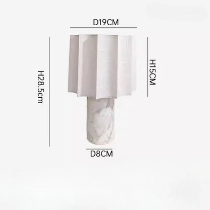 Natural marble table lamp switched off showing stone texture in daylight
