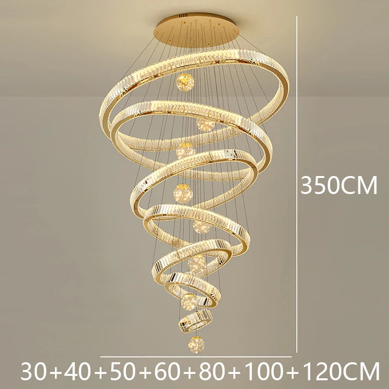 Cold white light across the crystal rings of a gilded chandelier