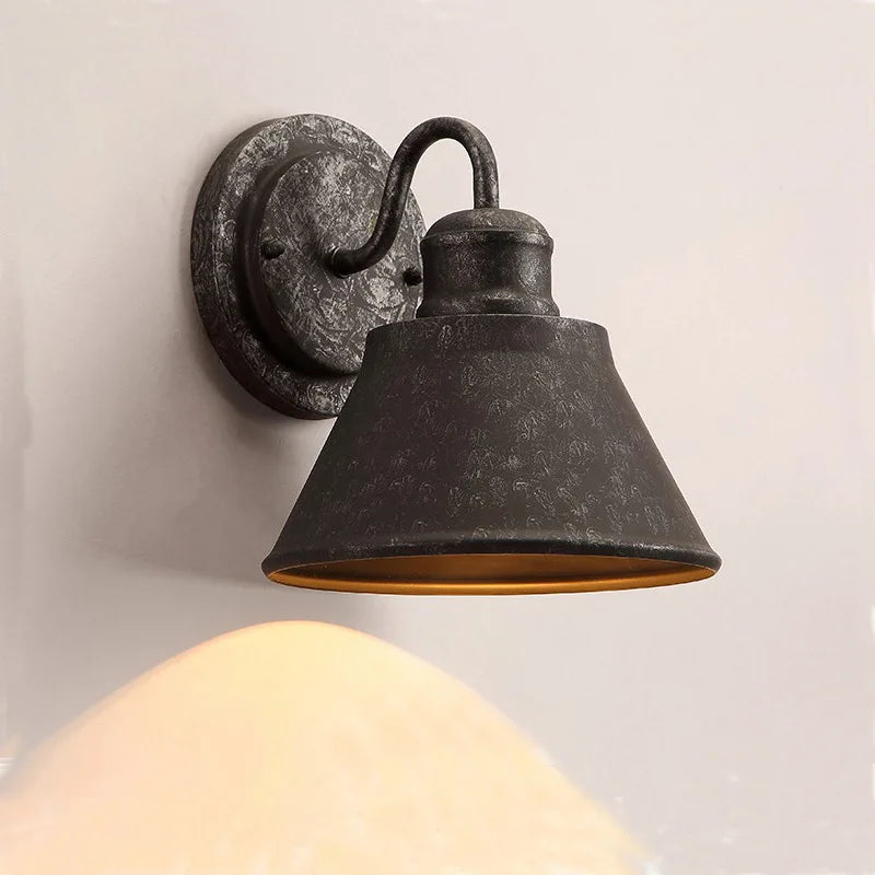 iron outdoor wall sconce, front view on white background