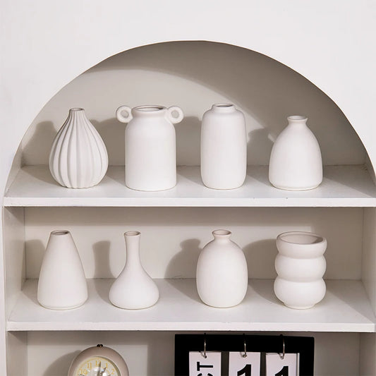 Nordic white ceramic mini vase on white shelf display
