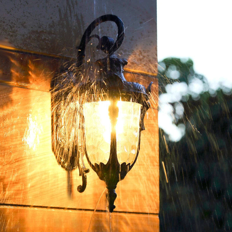 outdoor wall sconce, detail view of fixture base and arm