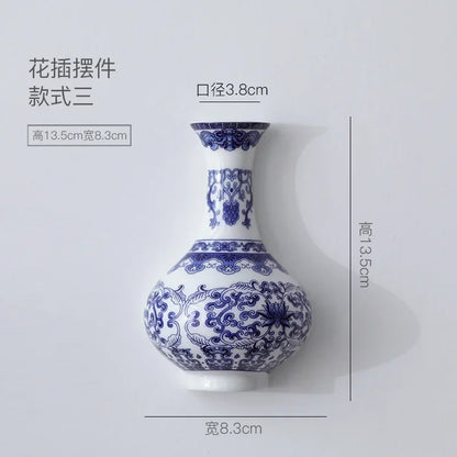 Style C tall blue white ceramic vase hanging on interior wall