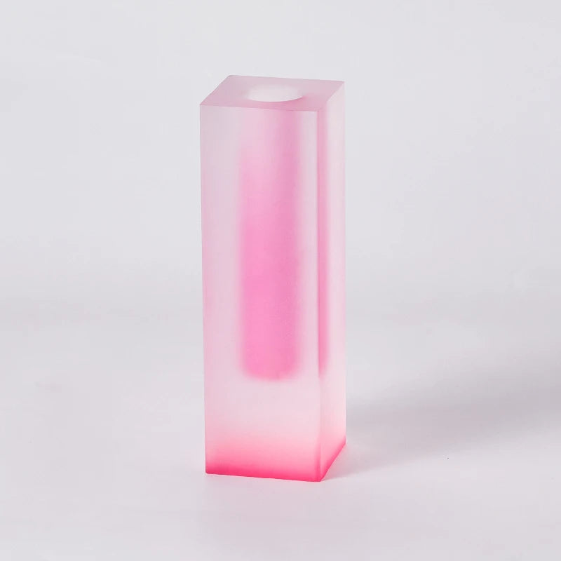 Purple-pink frosted acrylic vase styled in modern Nordic living room setting