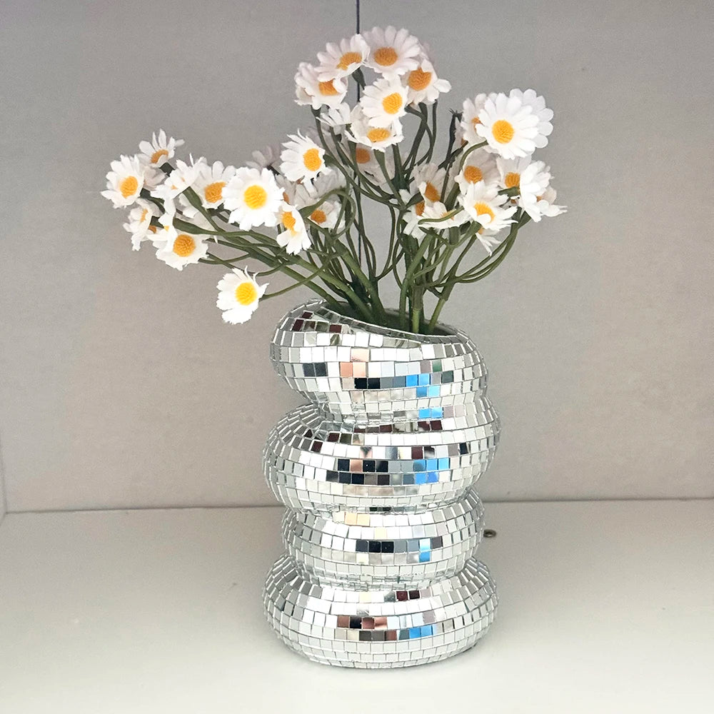 Small disco ball glass vase displayed as a glamorous shelf accent piece