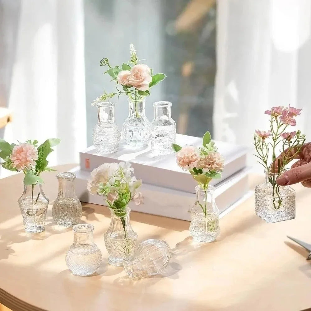 Clear relief glass mini vases with dried flowers as home desktop scene