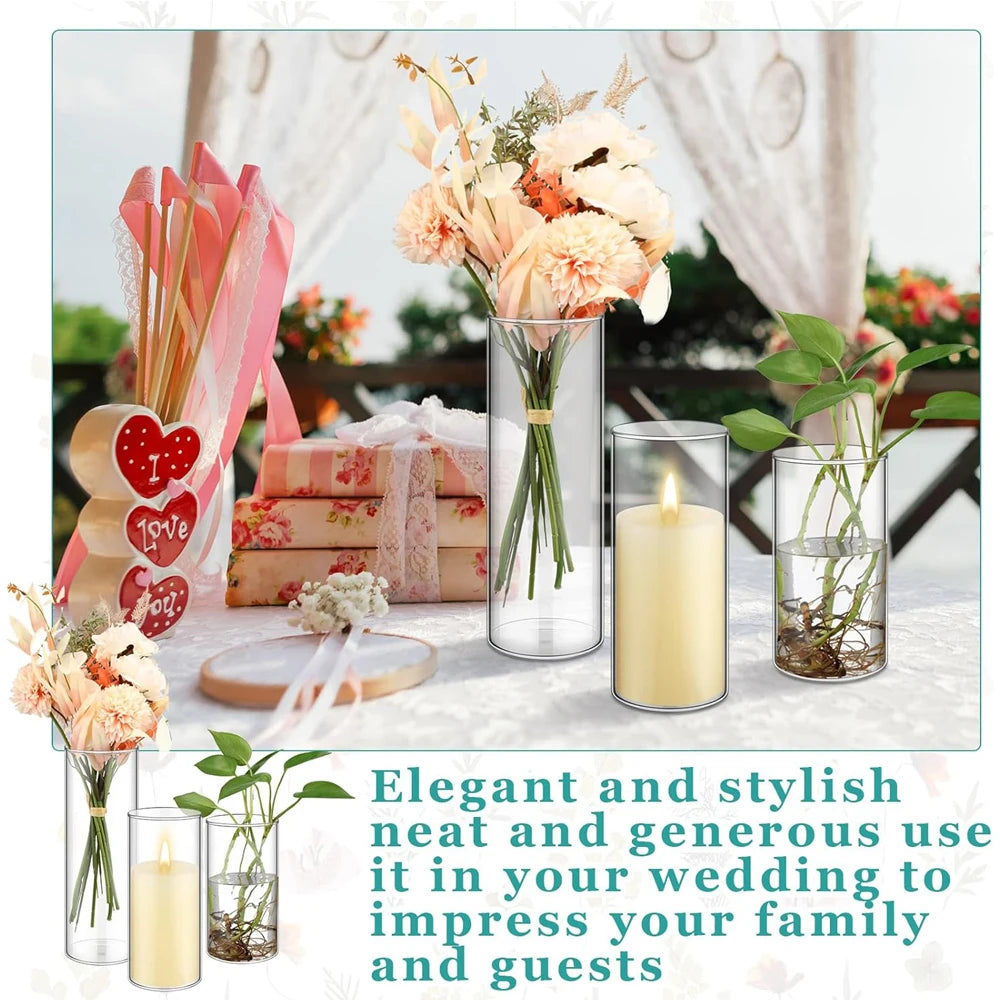 Glass cylinder vases with flower arrangements lined along wedding aisle decor