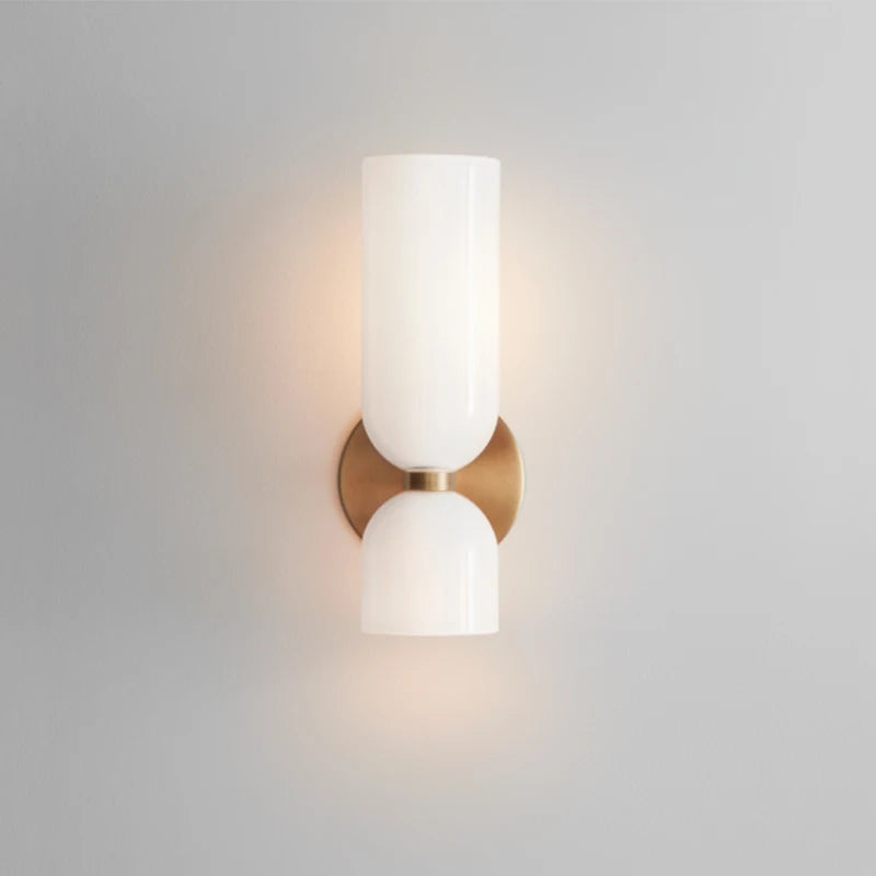 glass wall sconce, installed in a room interior setting