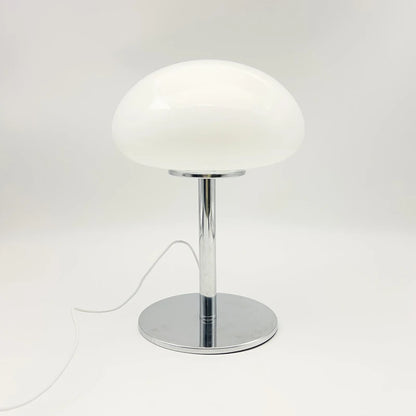 Cloud table lamp in dark room warm ambient glow atmospheric view