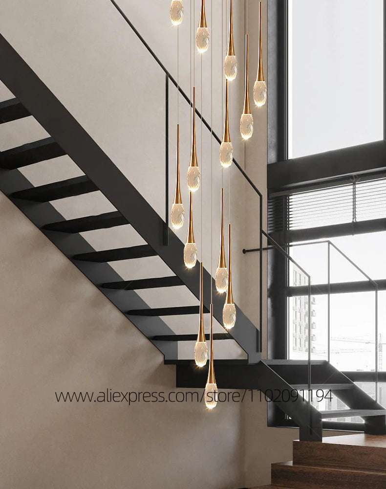 Crystal rod detail on a polished plated aluminum chandelier frame in gold