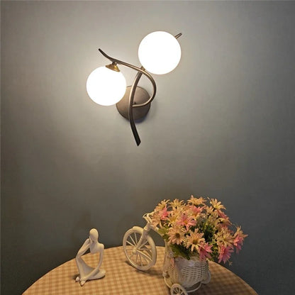 glass wall sconce, installed in a room interior setting