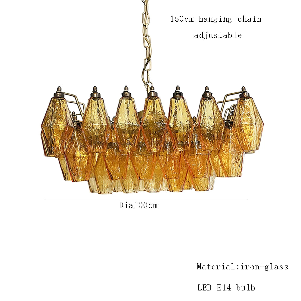 Grey clear glass chandelier shades on polished steel, warm light setting