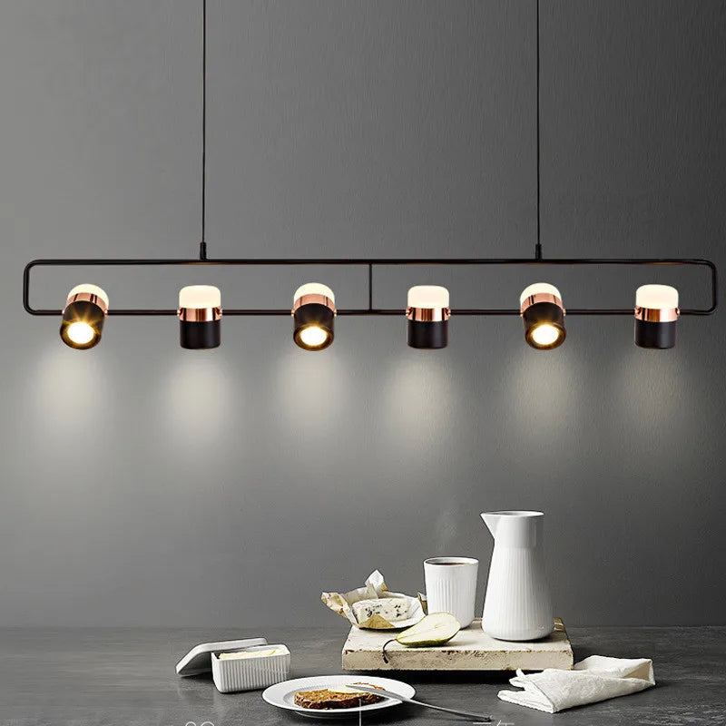 Rotatable spotlight chandelier with angled heads on aluminum arms