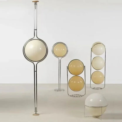 Chrome acrylic ball floor lamp yellow lampshade warm light front view