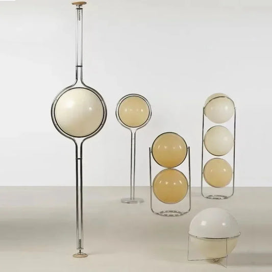 Chrome acrylic ball floor lamp yellow lampshade warm light front view