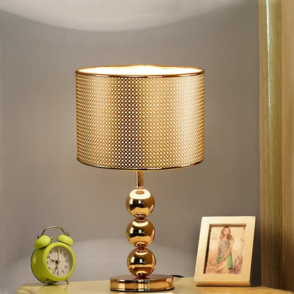 Close-up of metal lampshade on Nordic touch-dimming desk lamp