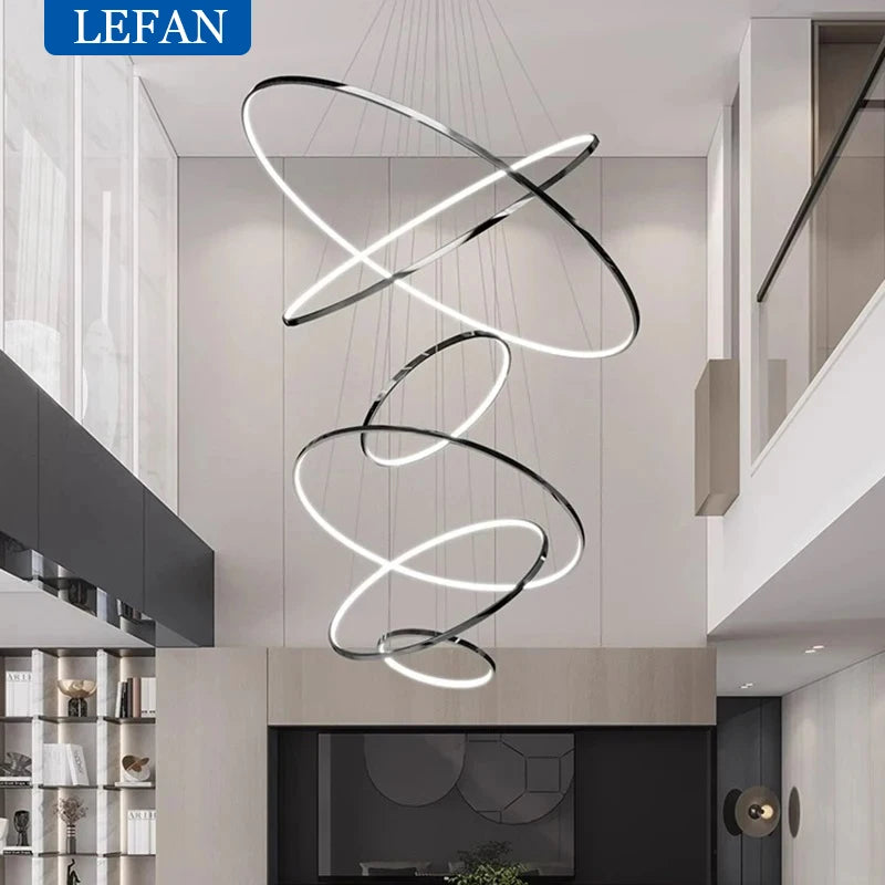 Five ring staircase chandelier suspended on a cord pendant drop