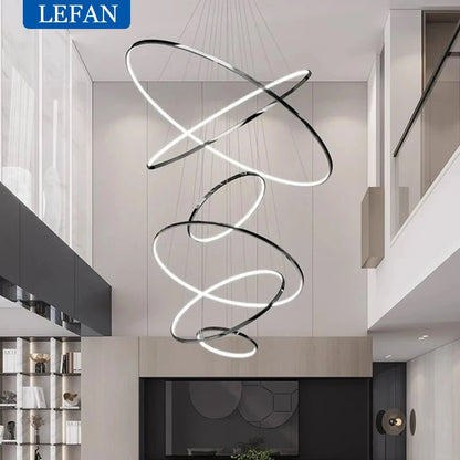 Five ring staircase chandelier suspended on a cord pendant drop