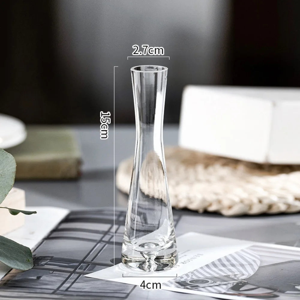 Slanted mouth glass vase with white hydrangea stems in Nordic interior