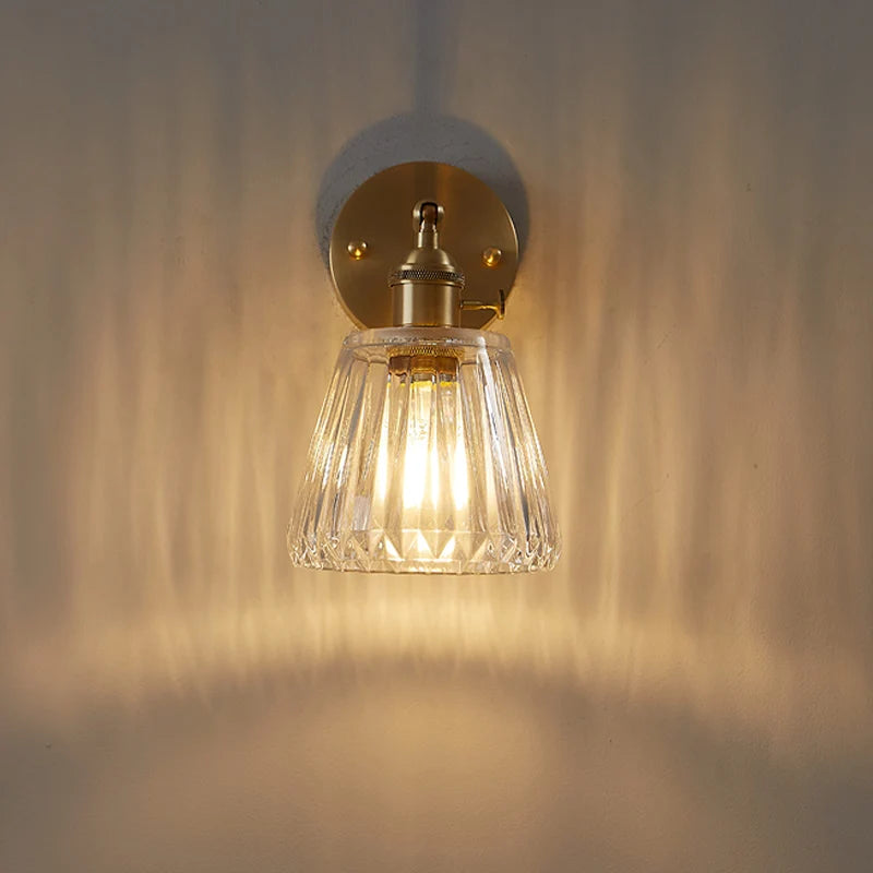 brass bathroom wall sconce, close-up of shade and hardware detail