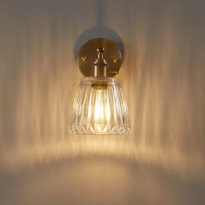 brass bathroom wall sconce, close-up of shade and hardware detail